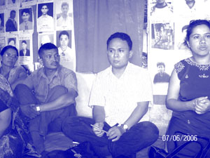 (Mugiyanto, third from left) intently listens to the cries of the families of the disappeared in Nepal.